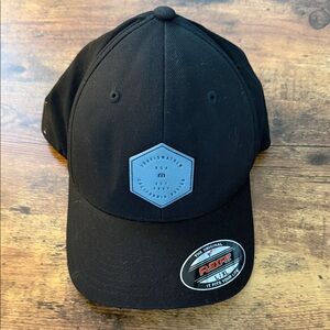 Travis Mathew Black Cap with Gray Logo